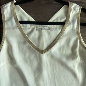 White blouse with gold trim